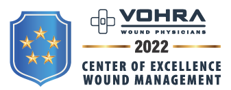 Vohra Wound Physicians Center of Excellence for Wound Management Logo