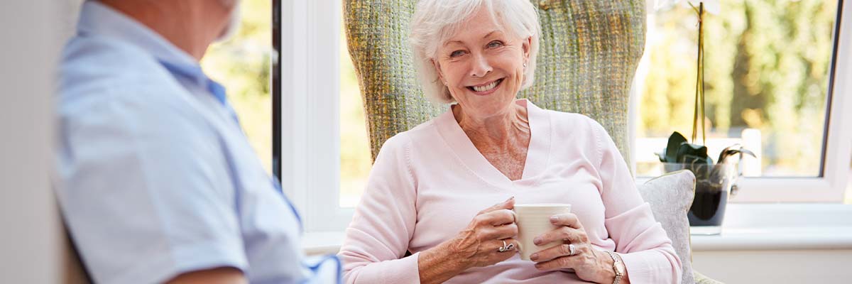 Pavilion residents enjoying coffee and laughing